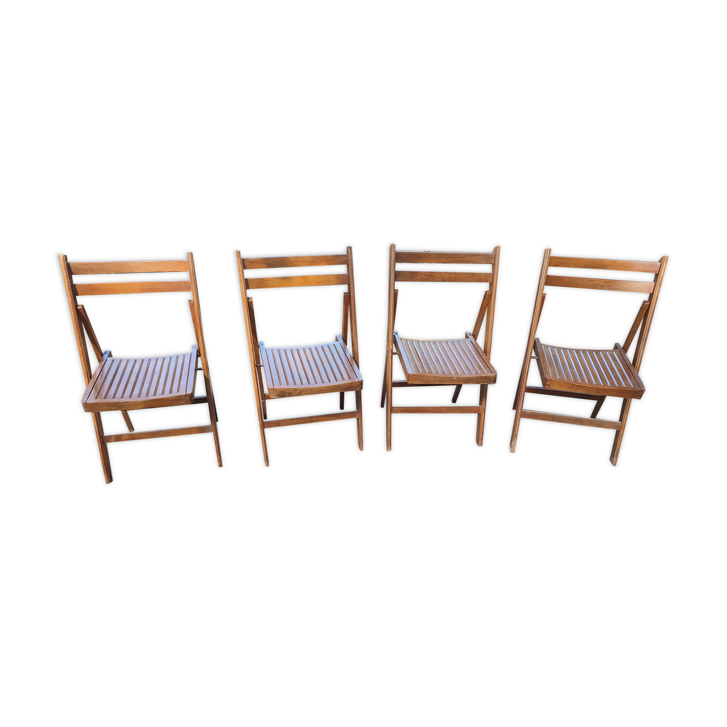 4 folding teak chairs