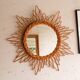 Miroir soleil vintage en rotin tressé
