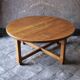round coffee table in solid wood brutalist design bohemian decor