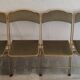 4 chaises pliantes en métal doré et velours vert