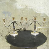 Pair of silver metal candlesticks