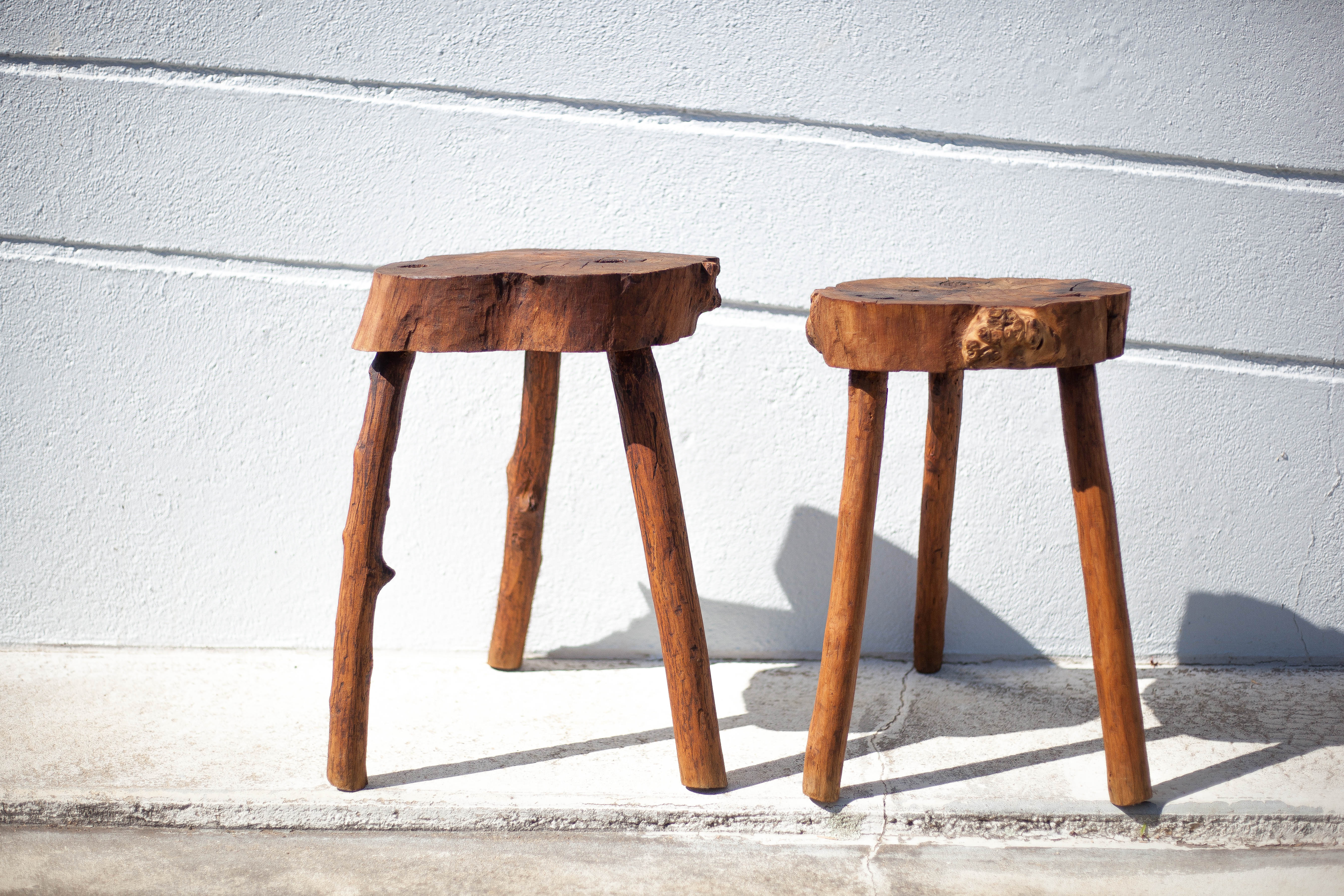 Pair of brutalist tripod wood stools