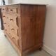 Sandblasted chest of drawers with white marble top