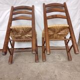 Brutalist chairs in walnut and straw