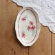 Ravier vintage ivory faience with floral rose decoration.