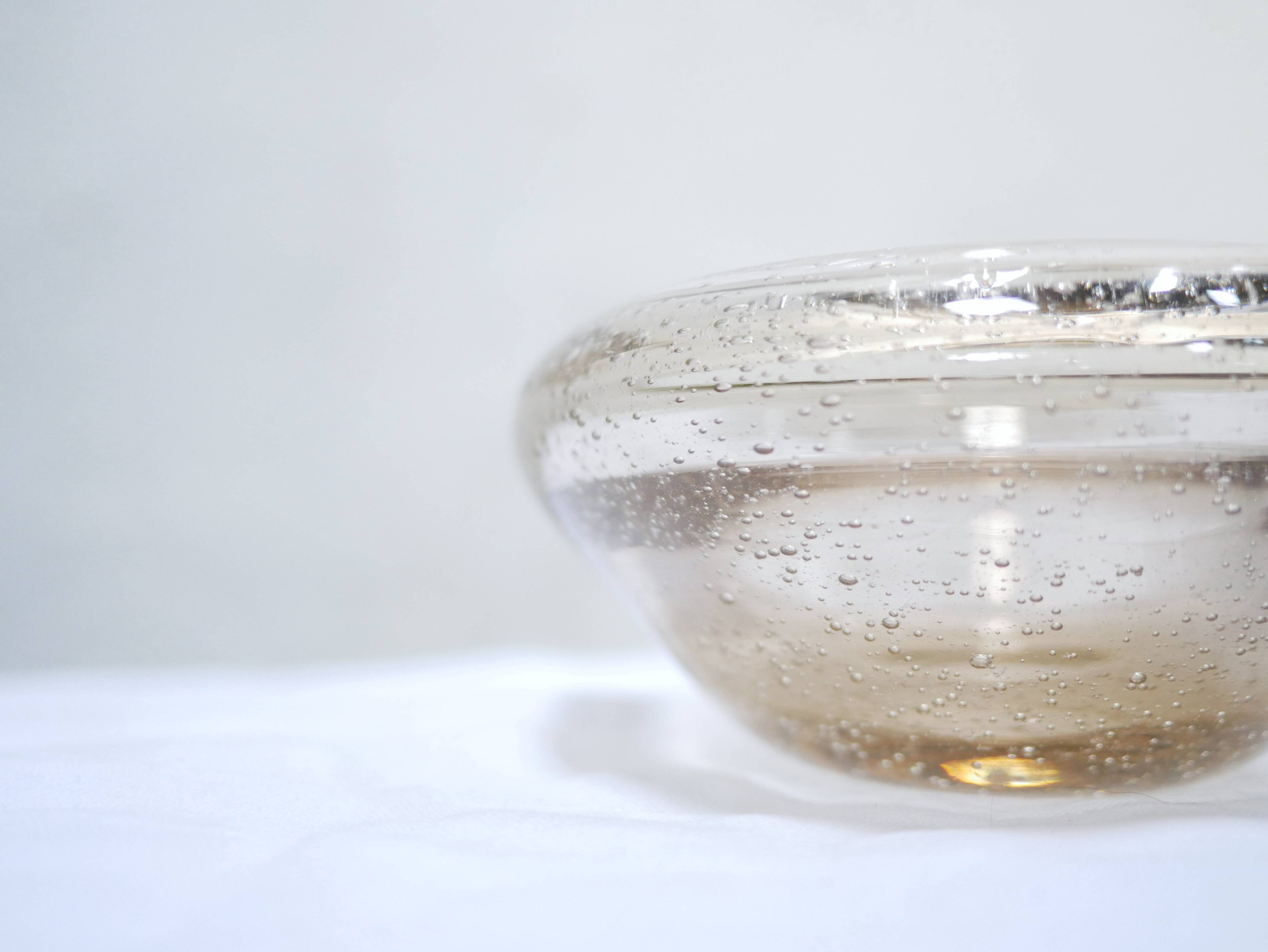 Empty vintage glass pocket blown by the glassworks of Biot
