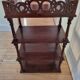 Antique Art Nouveau shelf in carved wood