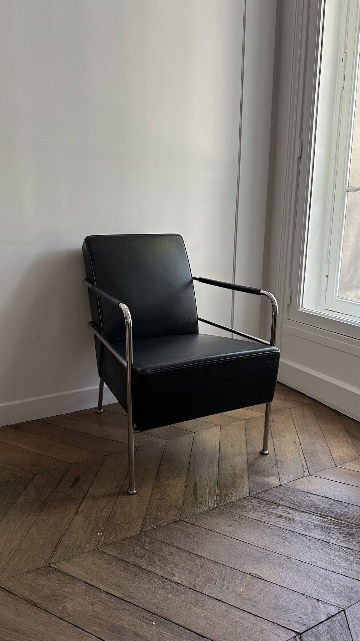 Sofa and armchair in Swedish black leather by Gunilla Allard for Lammhults.