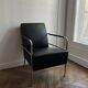 Sofa and armchair in Swedish black leather by Gunilla Allard for Lammhults.