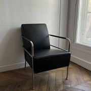 Sofa and armchair in Swedish black leather by Gunilla Allard for Lammhults.