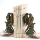 Art Deco pair of bookends with metal parrots and a marble base.