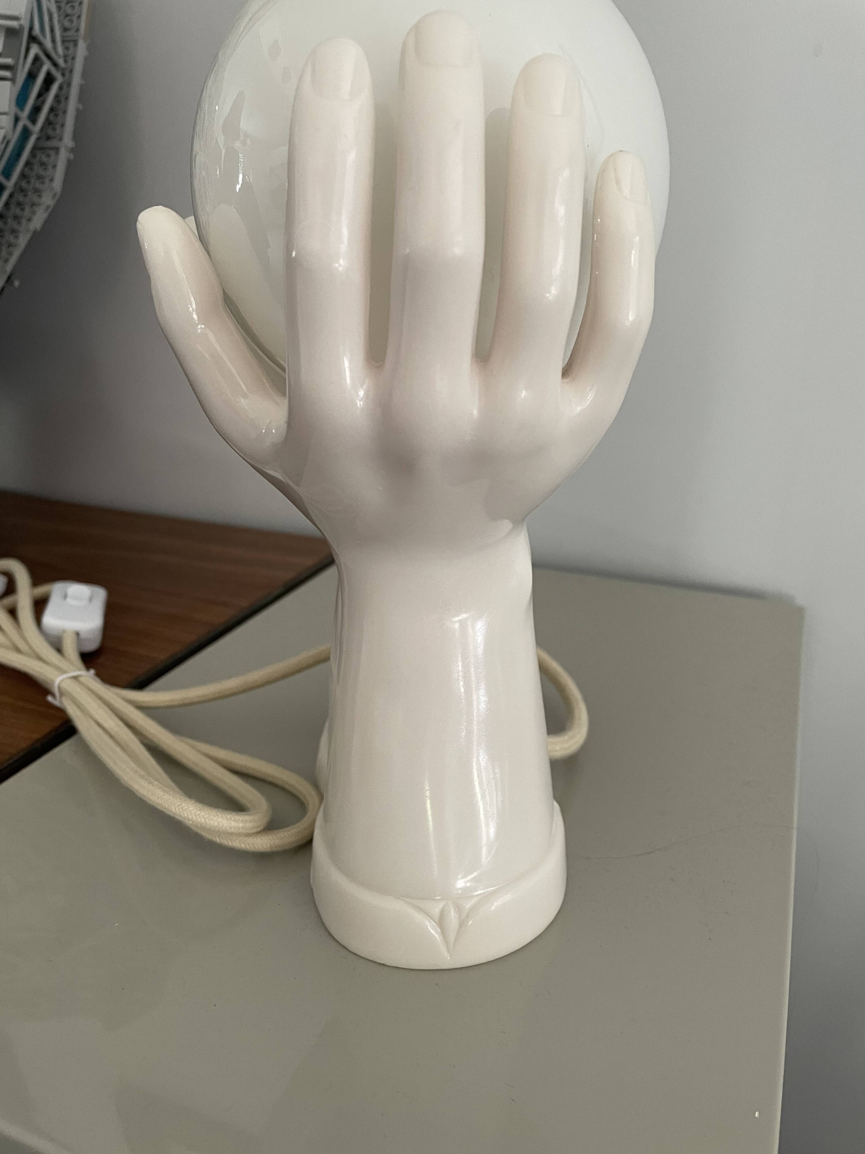 Resin hand-shaped table lamp