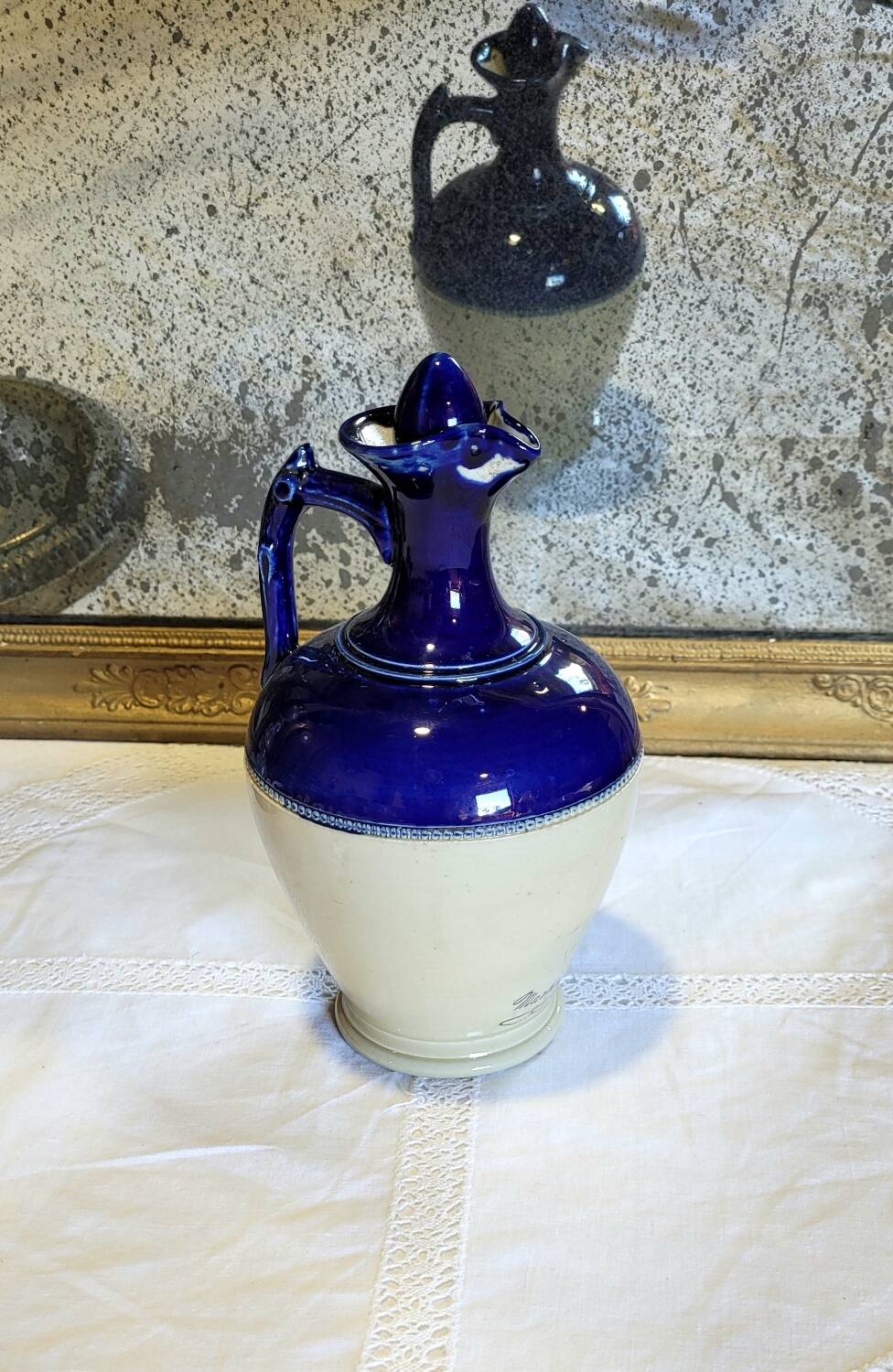 Antique iron-rich earth bottle from Saint Uze, ceramic carafe jug.