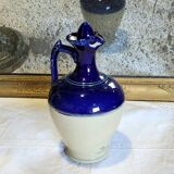 Antique iron-rich earth bottle from Saint Uze, ceramic carafe jug.