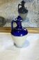 Antique iron-rich earth bottle from Saint Uze, ceramic carafe jug.