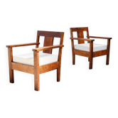 Pair of French modernist teak armchairs, 1960s