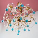 Italian chandelier in gold metal and blue crystal drops