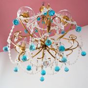 Italian chandelier in gold metal and blue crystal drops