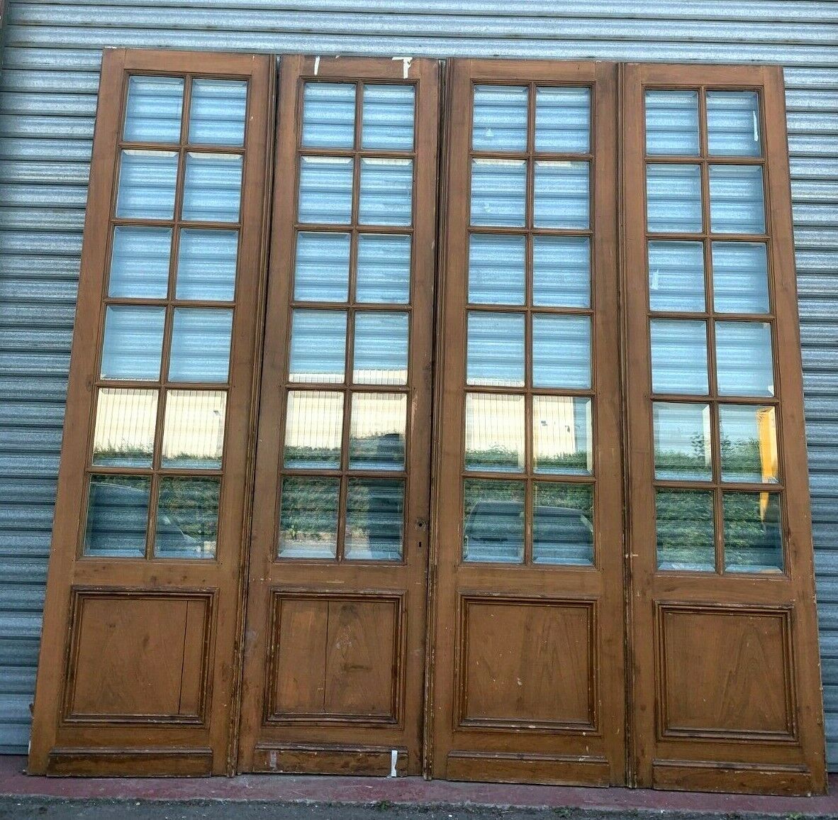 Suite of four separation doors in patinated wood Beveled tiles XX century