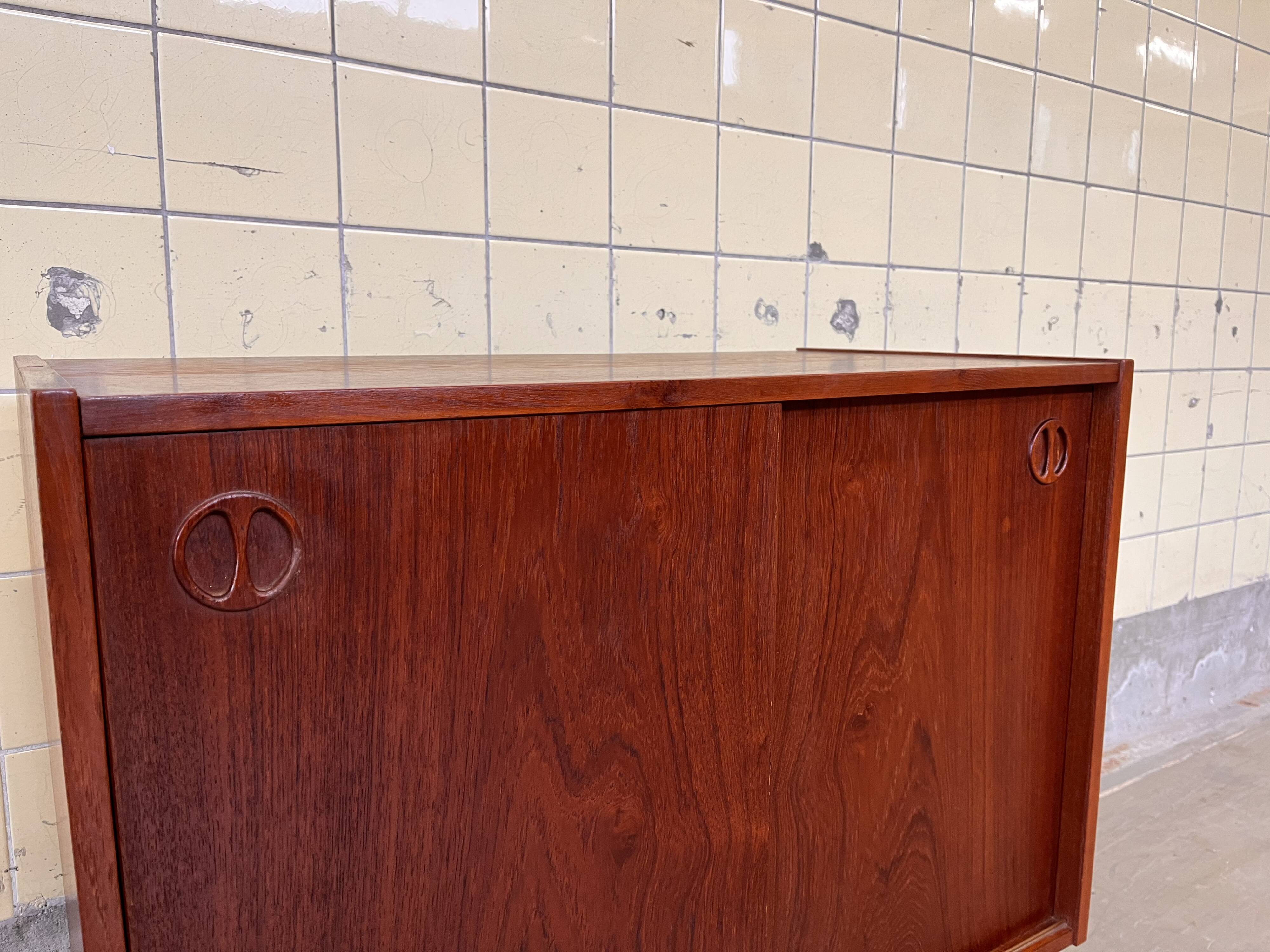 Vintage Danish cabinet with sliding doors