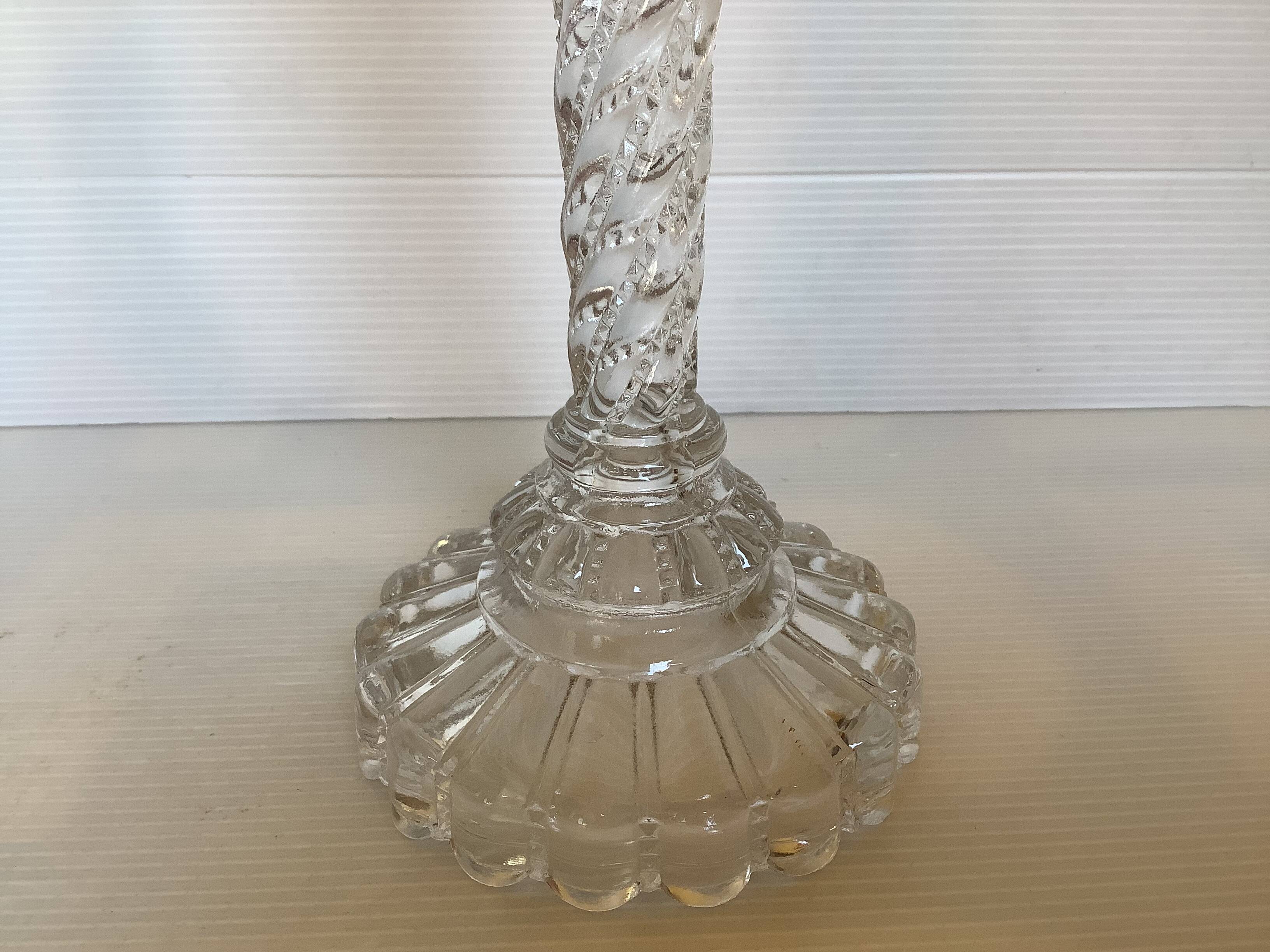 Pair of old twisted candlesticks with diamond tips.