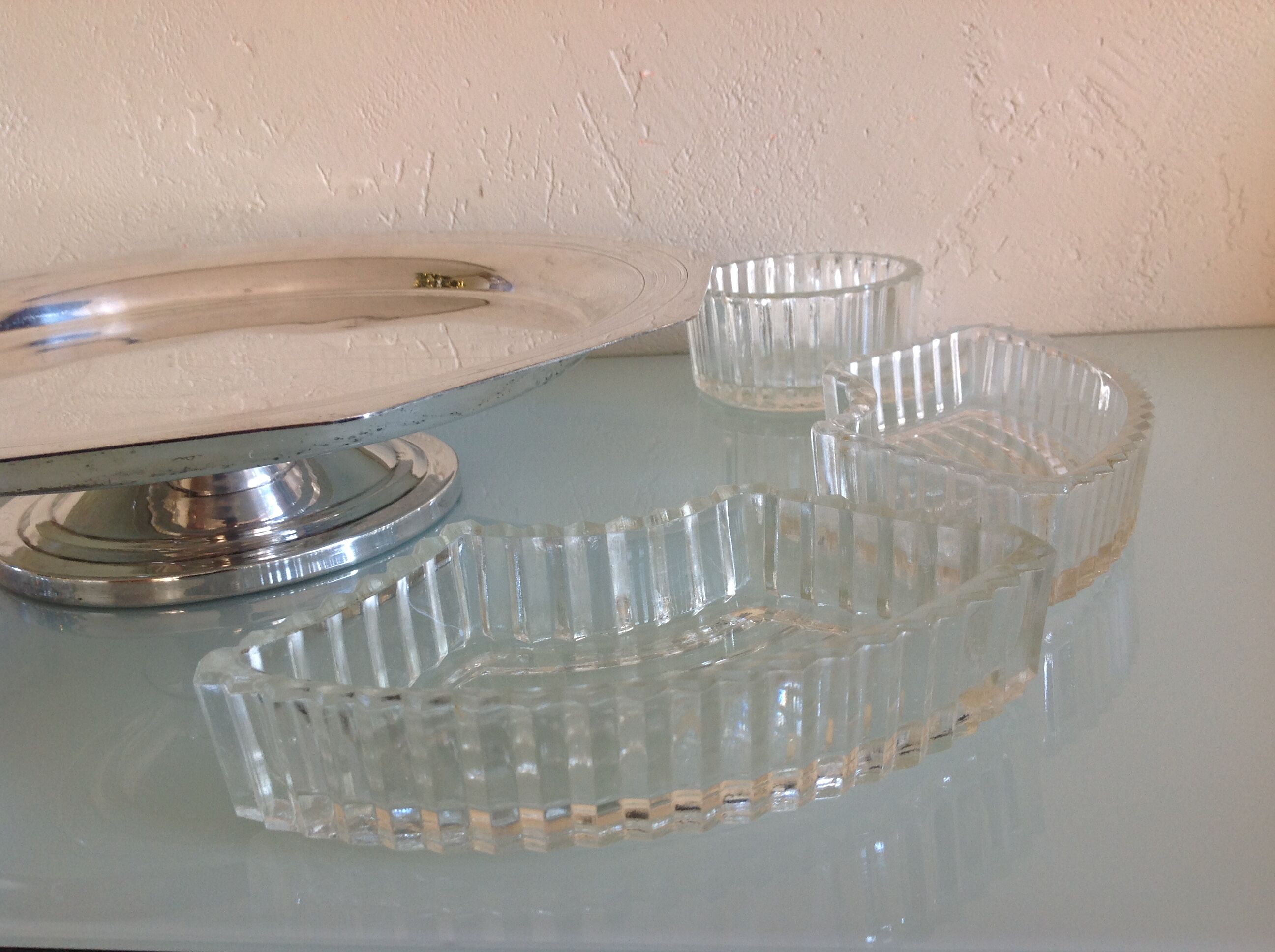Servant of table on foot shower in silver metal art deco style