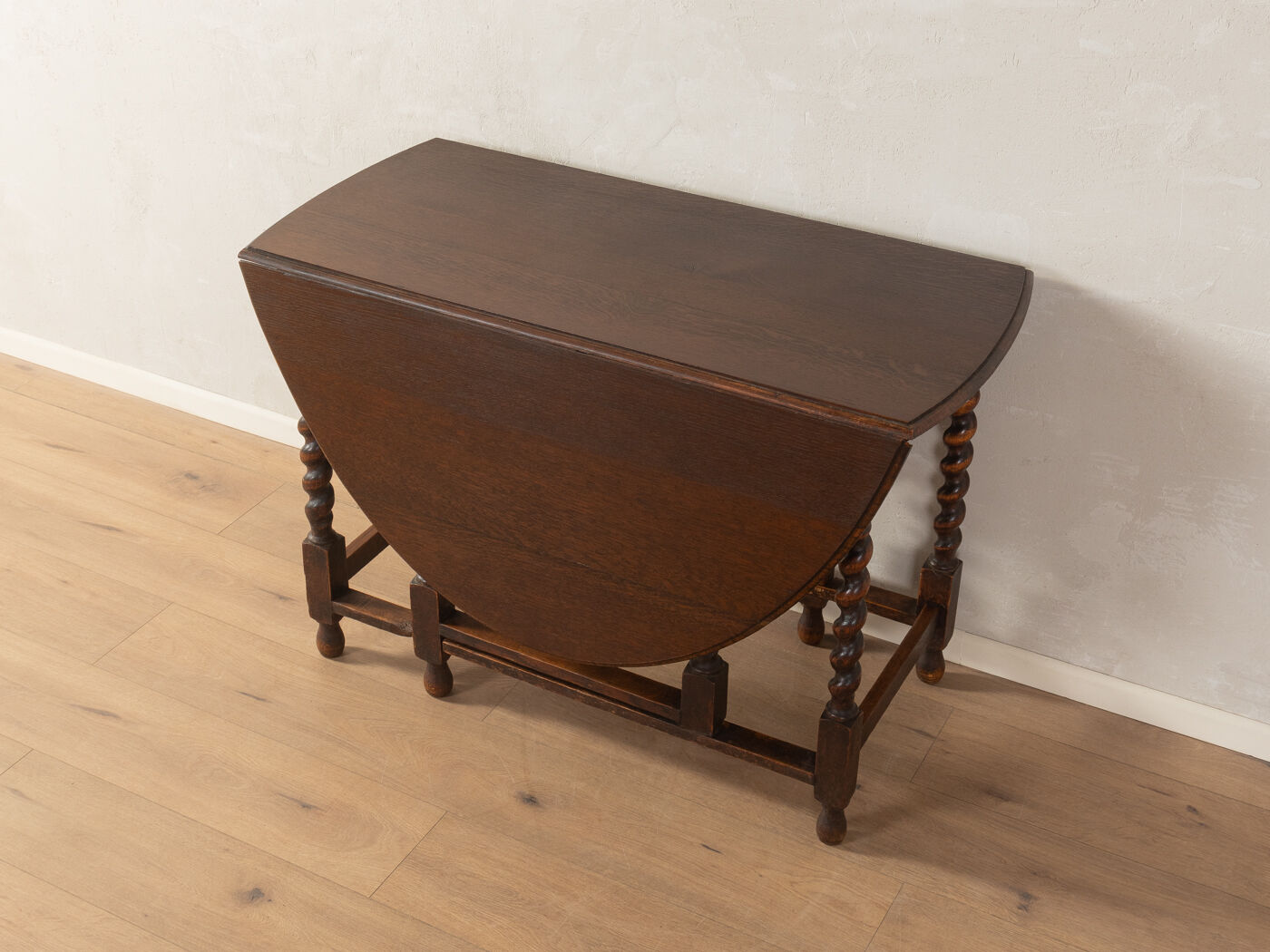 Antique gateleg table from the 1920s, solid oak