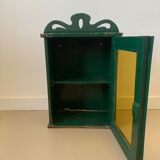 Wall vitrin with pediment