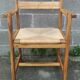 Paire de fauteuils années 50 paille et bois