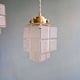 Pair of Art Deco Skyscraper satin glass pendant lights, 1930s