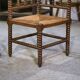 Pair of turned wooden corner chairs from the 1950s.
