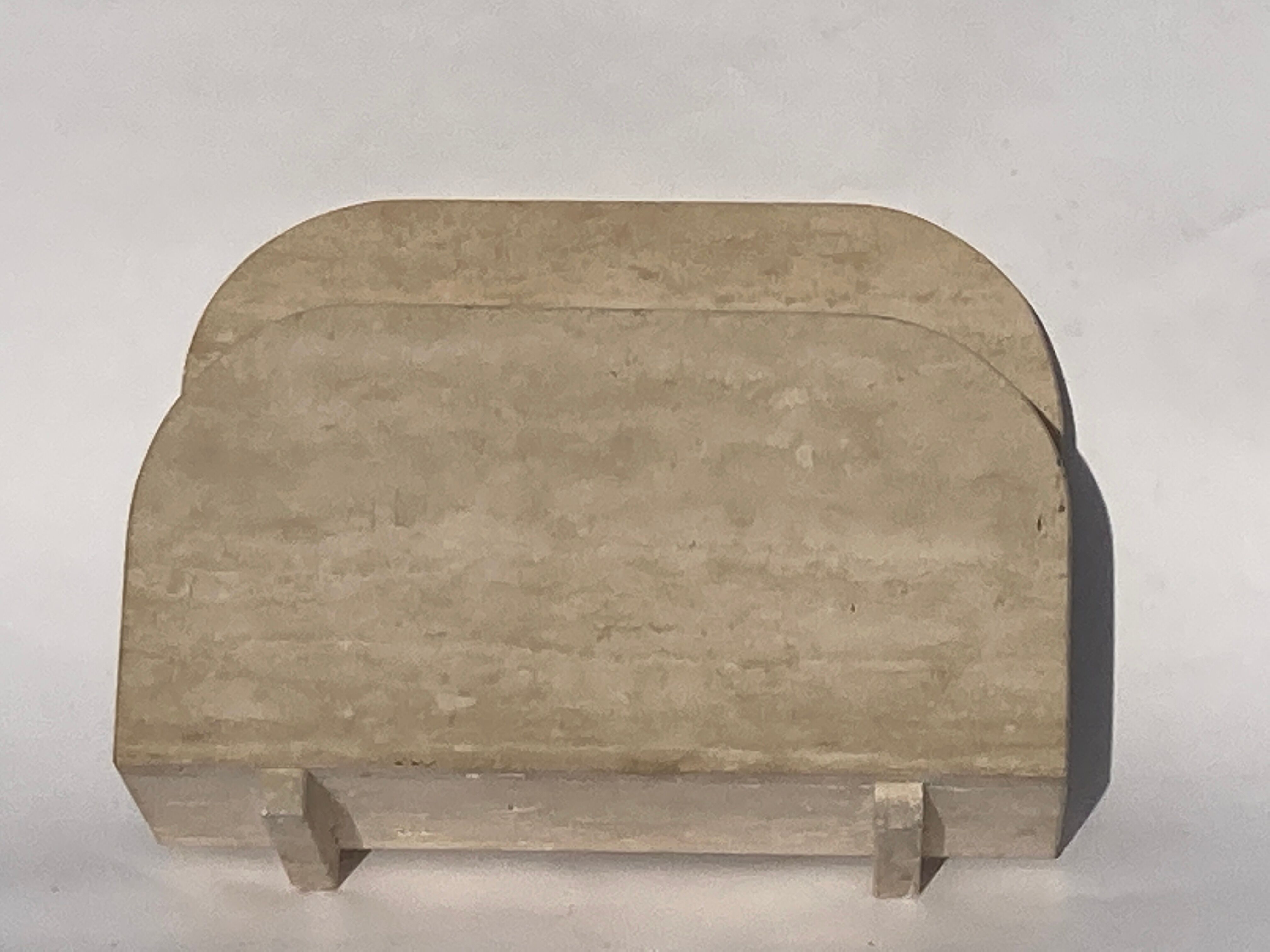 Travertin magazine rack