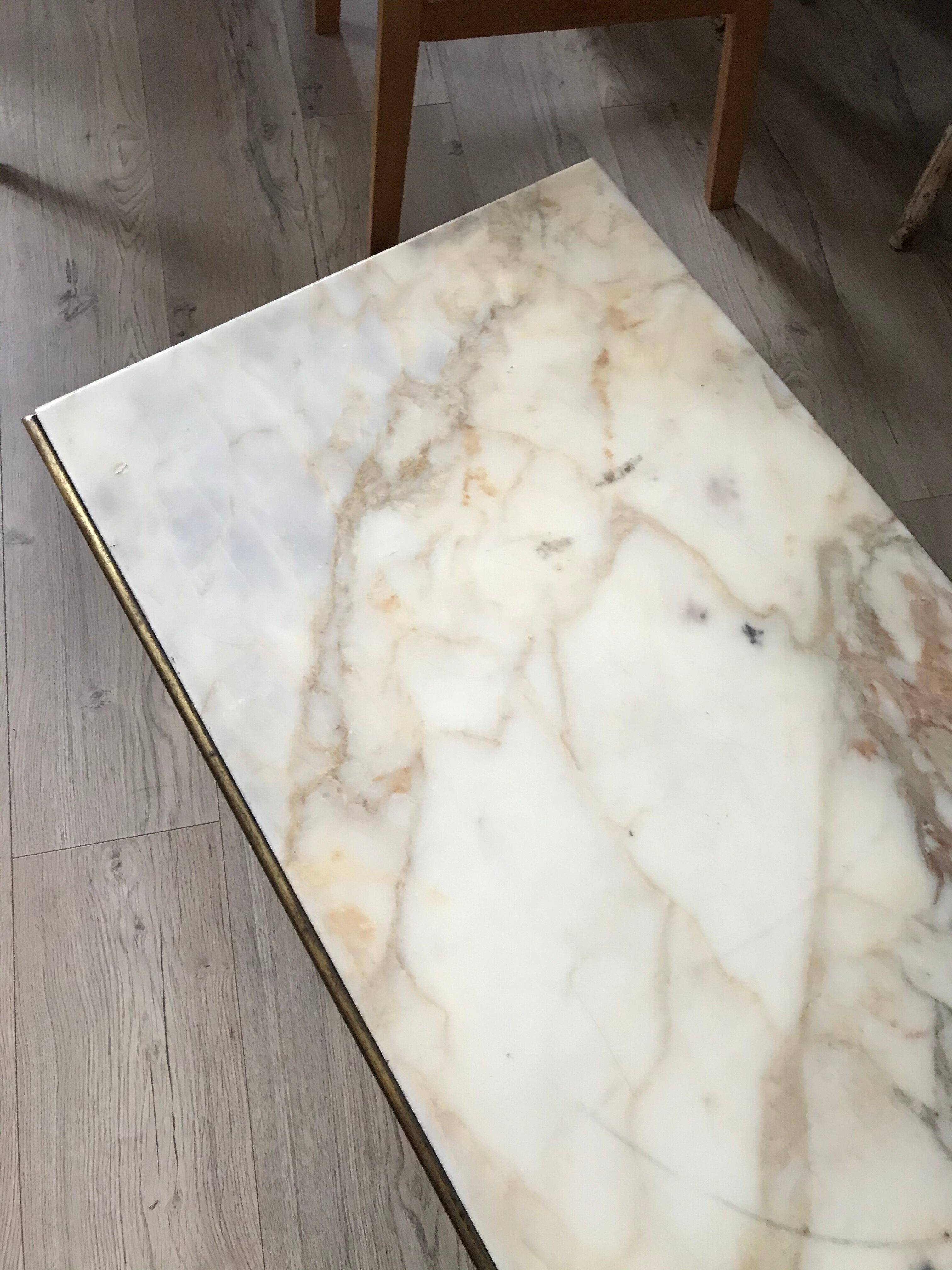 Marble and golden patina iron coffee table