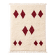 Minimalist cream Berber rug with red diamonds.