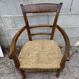 Antique straw armchair