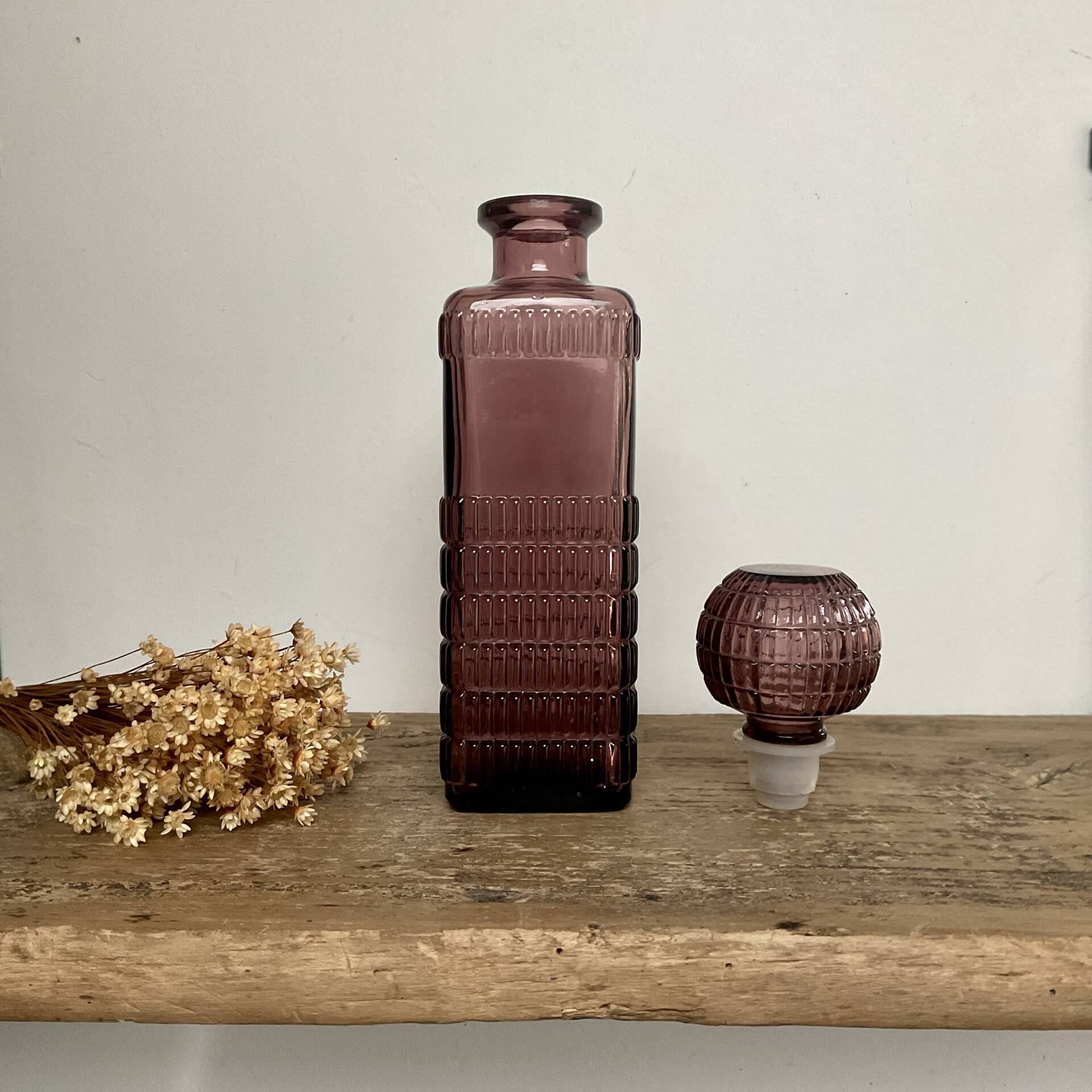 Plum glass bottle