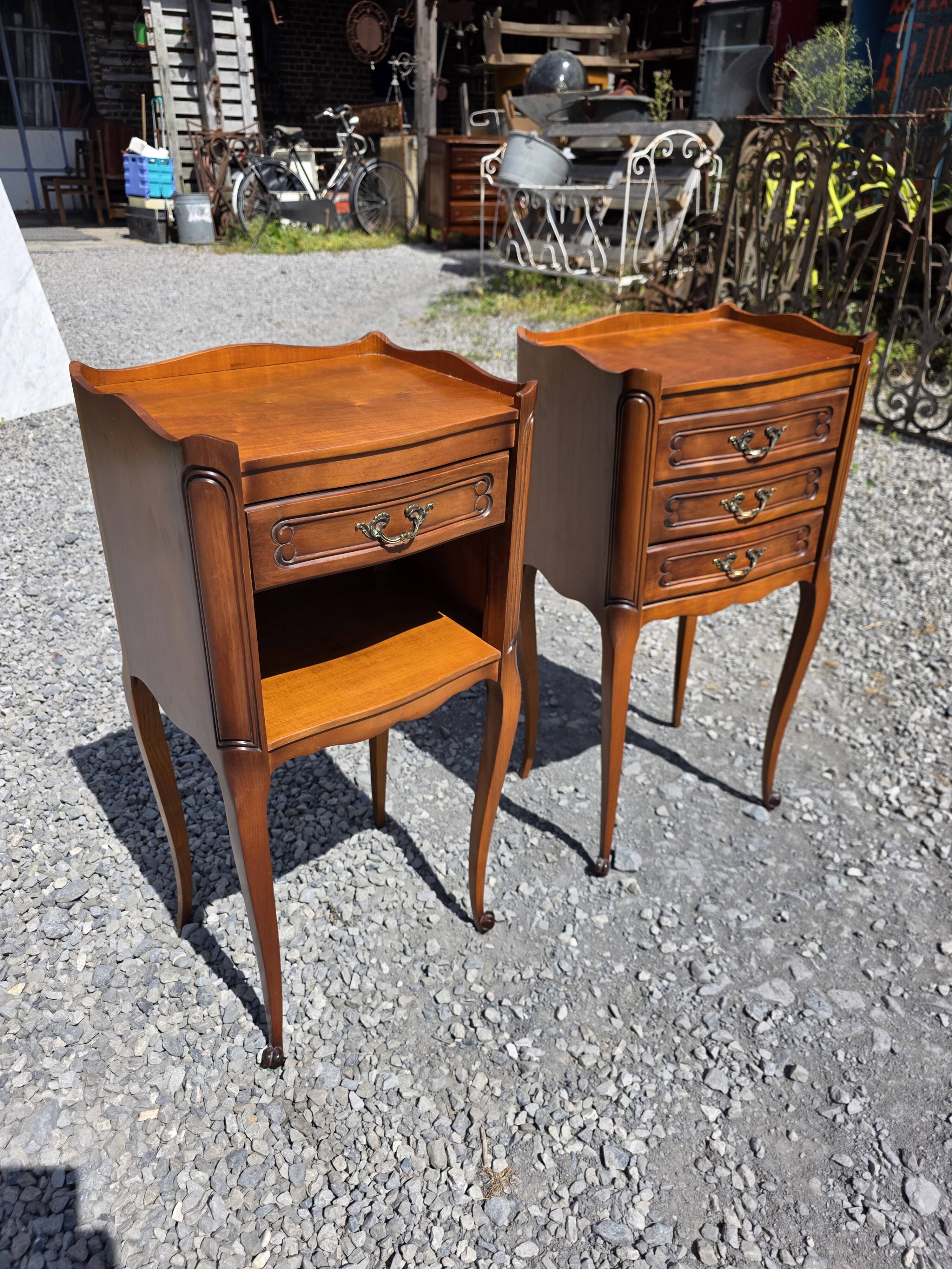 Pair of Louis XV style bedside tables in cherry wood.