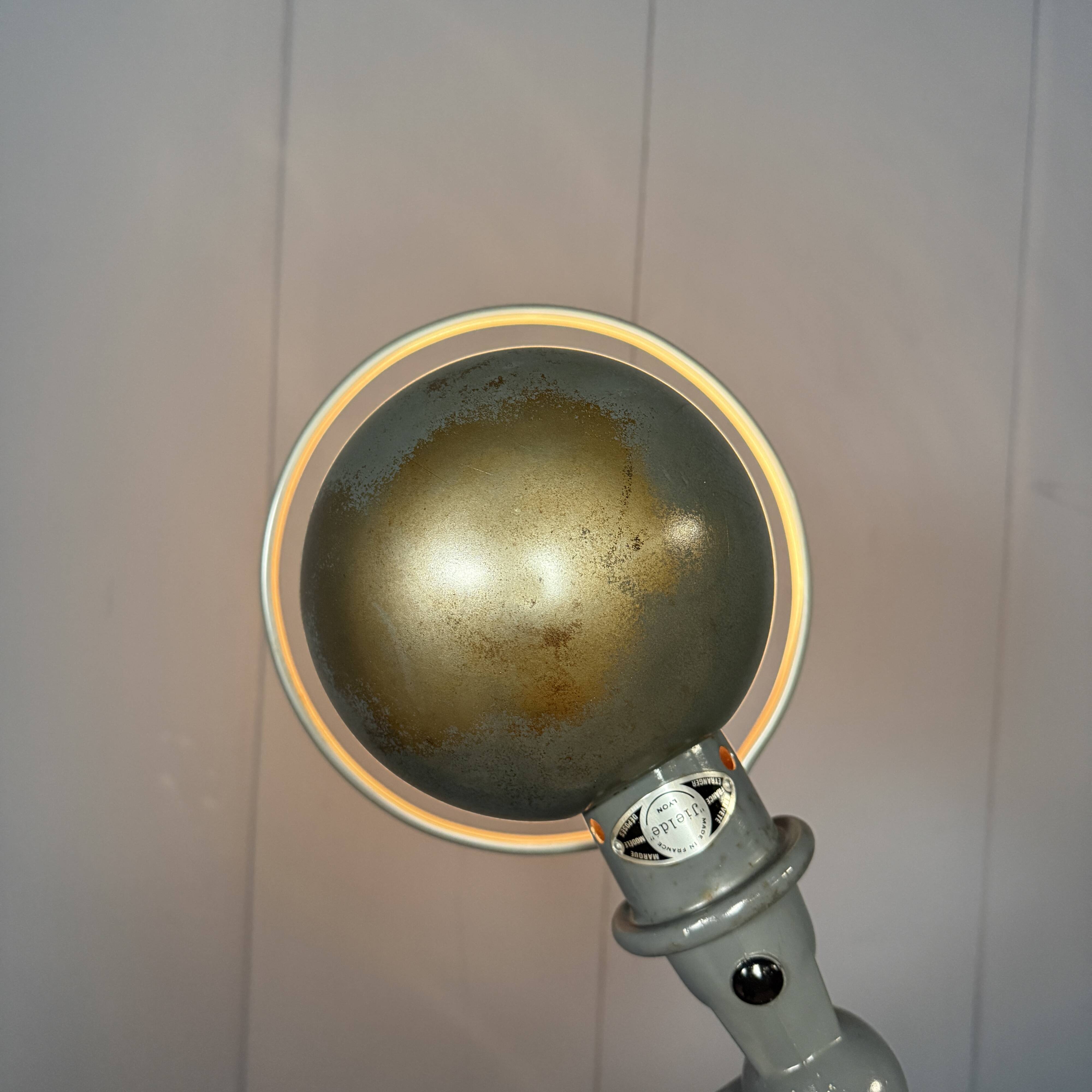 Dark grey Jielde three-arm clamp table lamp