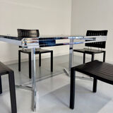 Smoked glass dining table with chrome legs, 1970s design by Roche Bobois.