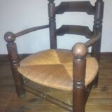 Low oak and straw armchair 1940