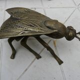 Old brass ashtray in the shape of a fly