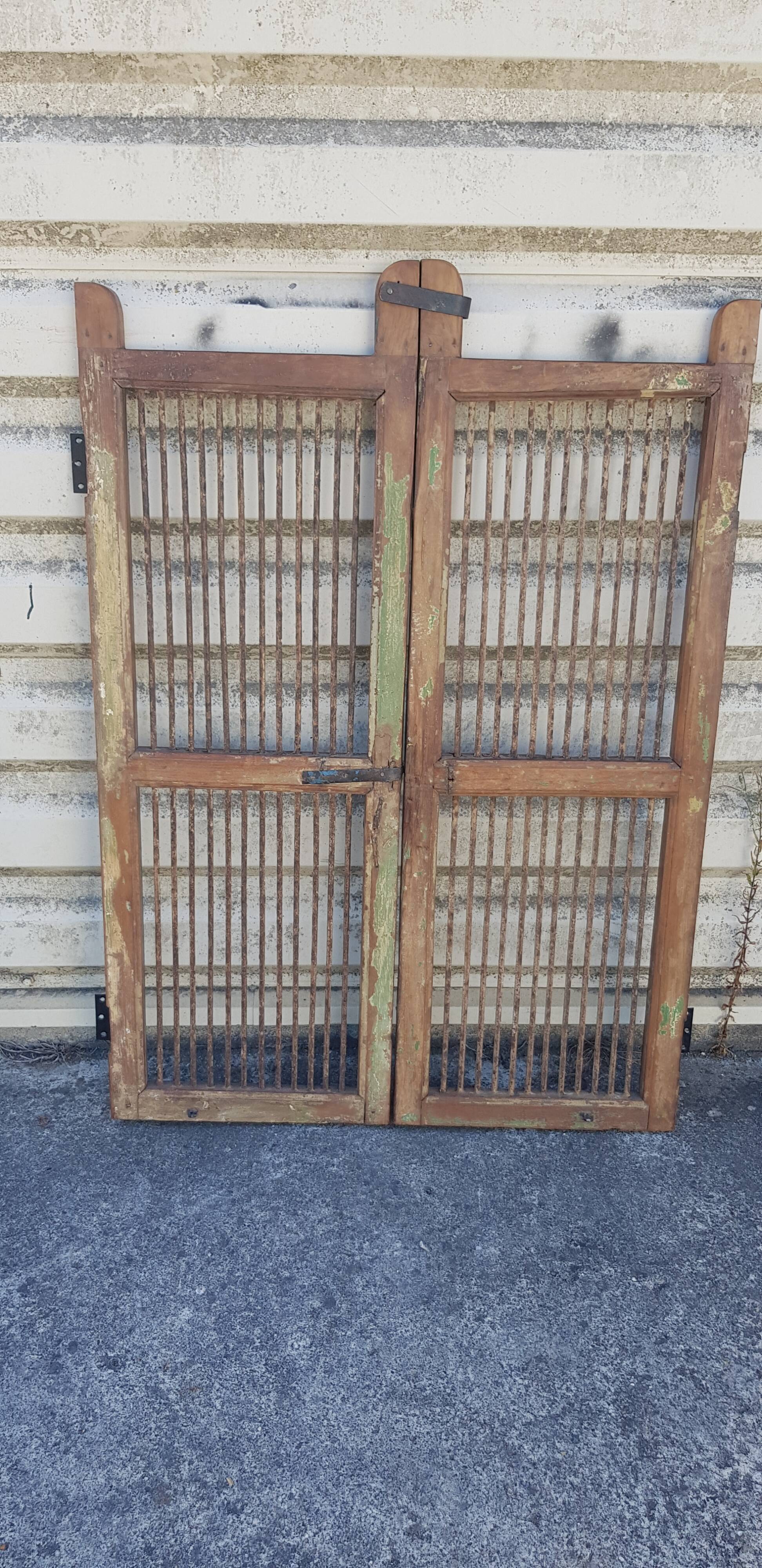 Old teak and wrought iron gate