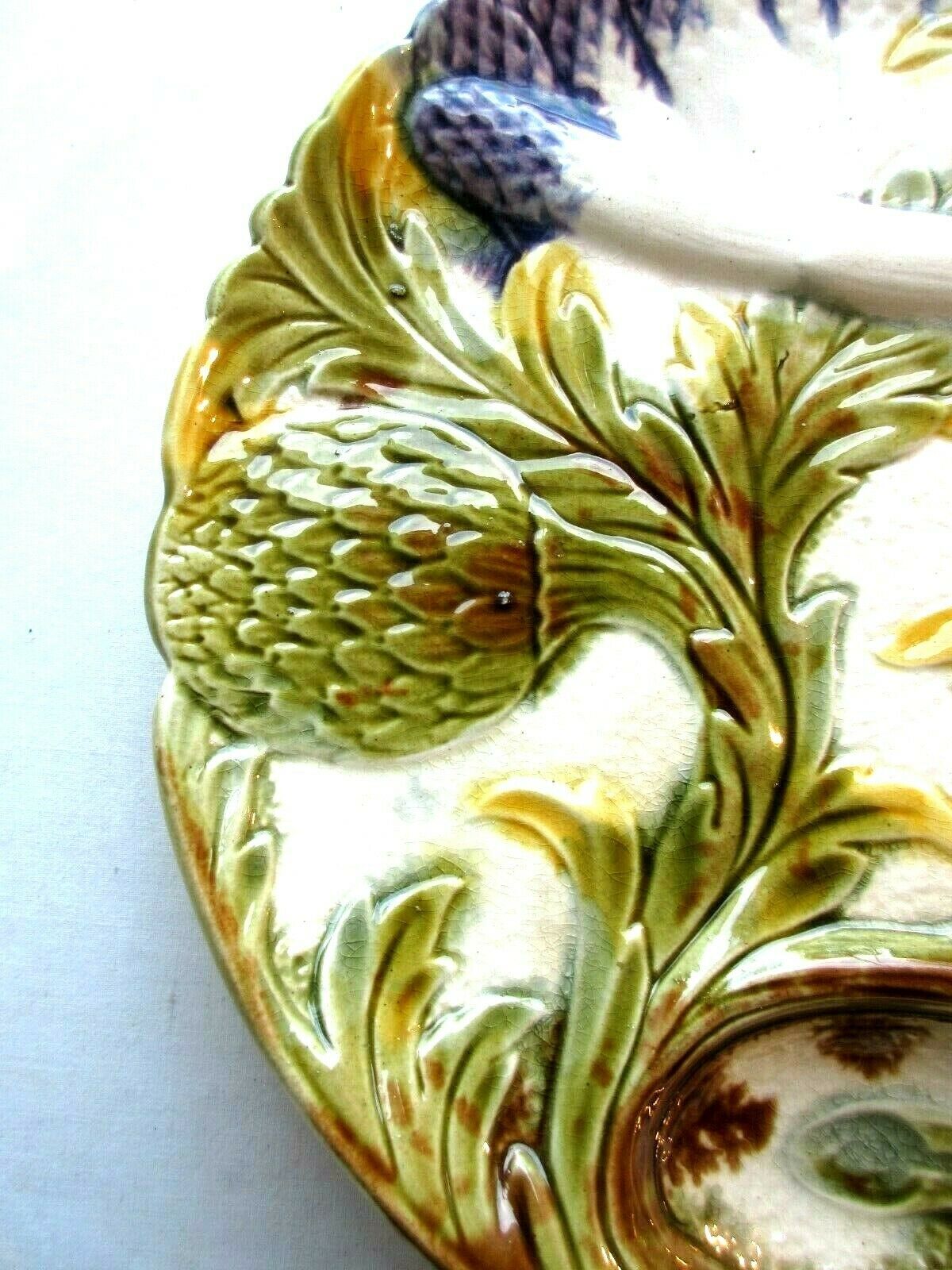 Old dabbling plate with 2 artichokes with leaves and several asparagus
