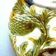 Old dabbling plate with 2 artichokes with leaves and several asparagus