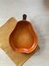 Ceramic dish in the shape of a pear.