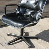 Pollock black leather reclining armchair with fixed ends