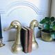 Pair of brass book ends 21cm