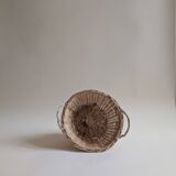 Round wicker basket in light wood