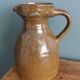 Rustic stoneware jug, chic countryside.