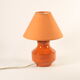 Orange ceramic table lamp with geometric imprints, 1970s.